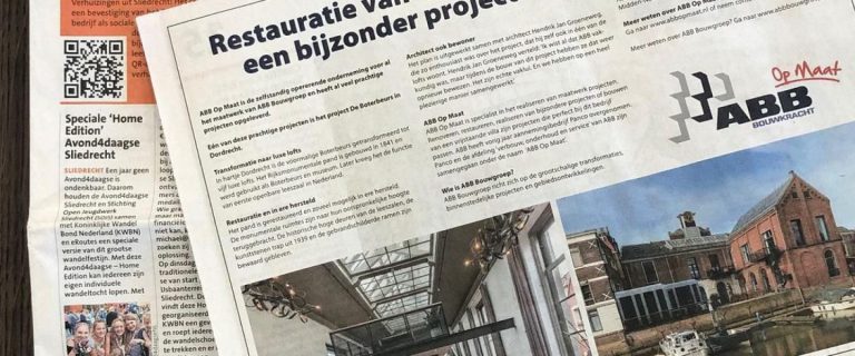 Afbeelding ABB Op Maat staat in de krant met het project de Boterbeurs in Dordrecht